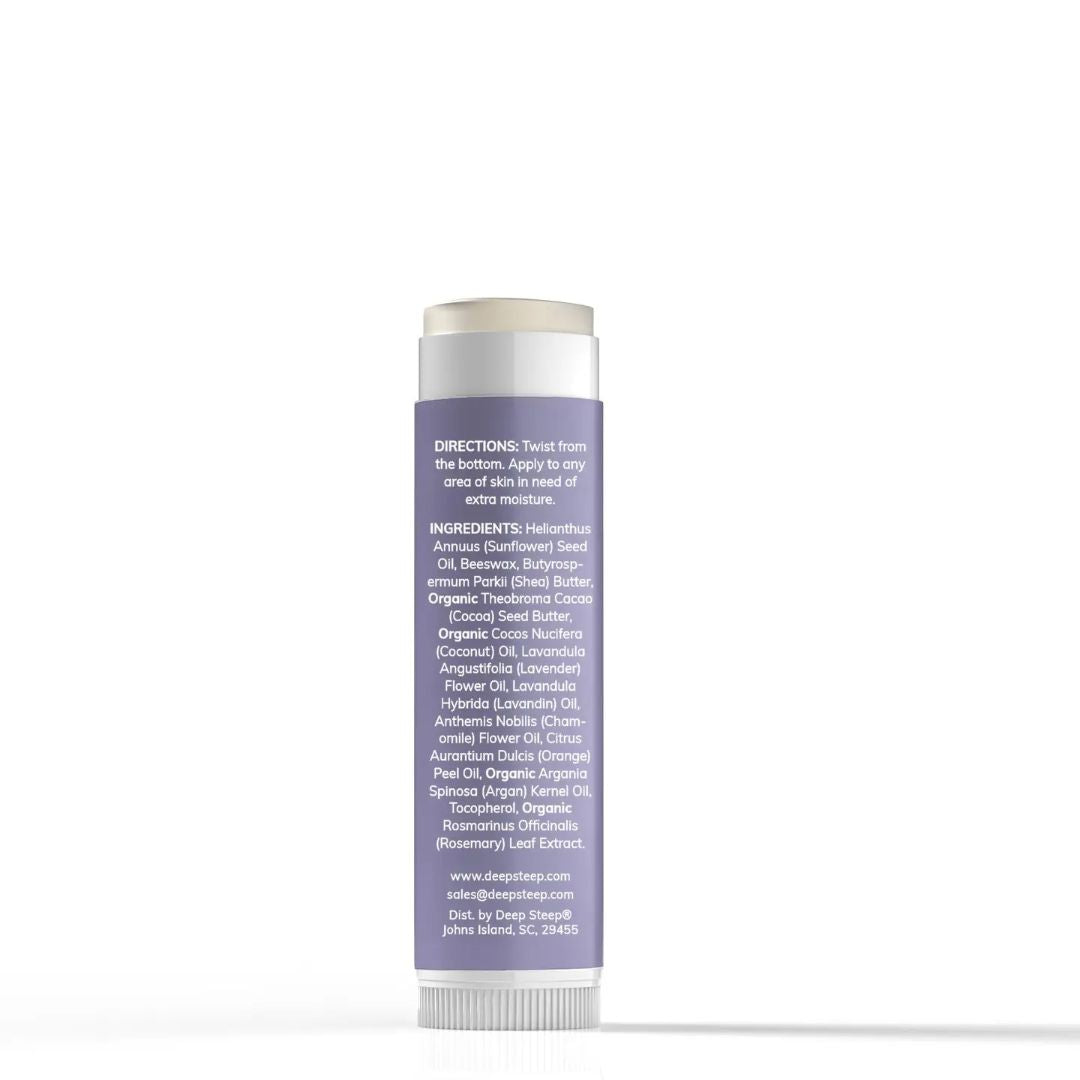Skincare stick the balm with purple label on a white background